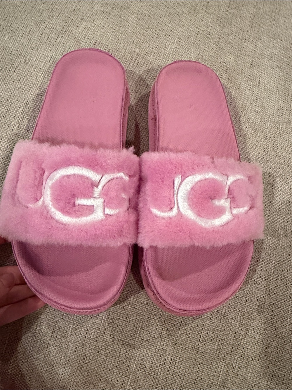 UGG women’s Pink Faux-Fur Logo Slide Sandals